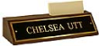 Polished brass name plates with an attractive walnut wood display base.