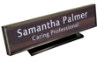 Laser engraved name plates in a variety of color options with attractive, framed display stand.