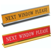 Laser engraved name plates in a variety of color options with attractive, raised display stand.
